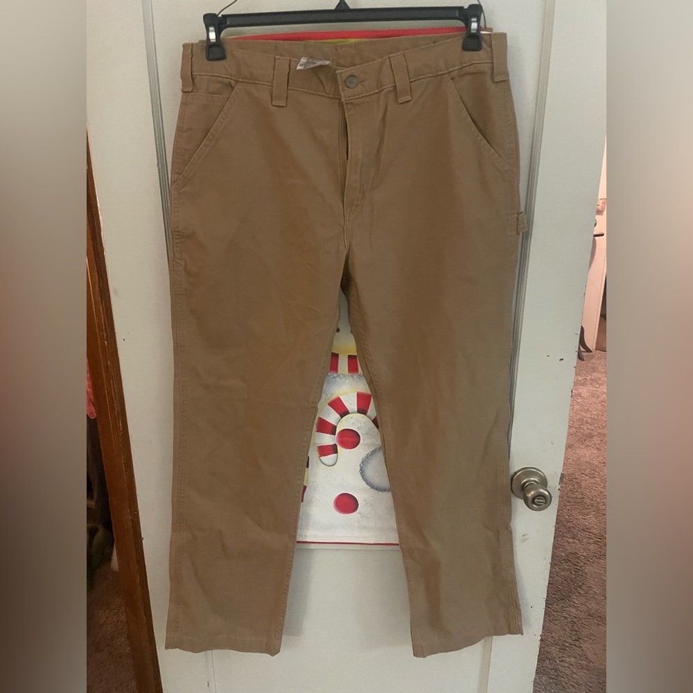 Mens NWT pants light brown in color. Brand is Carhartt size is 36X32
